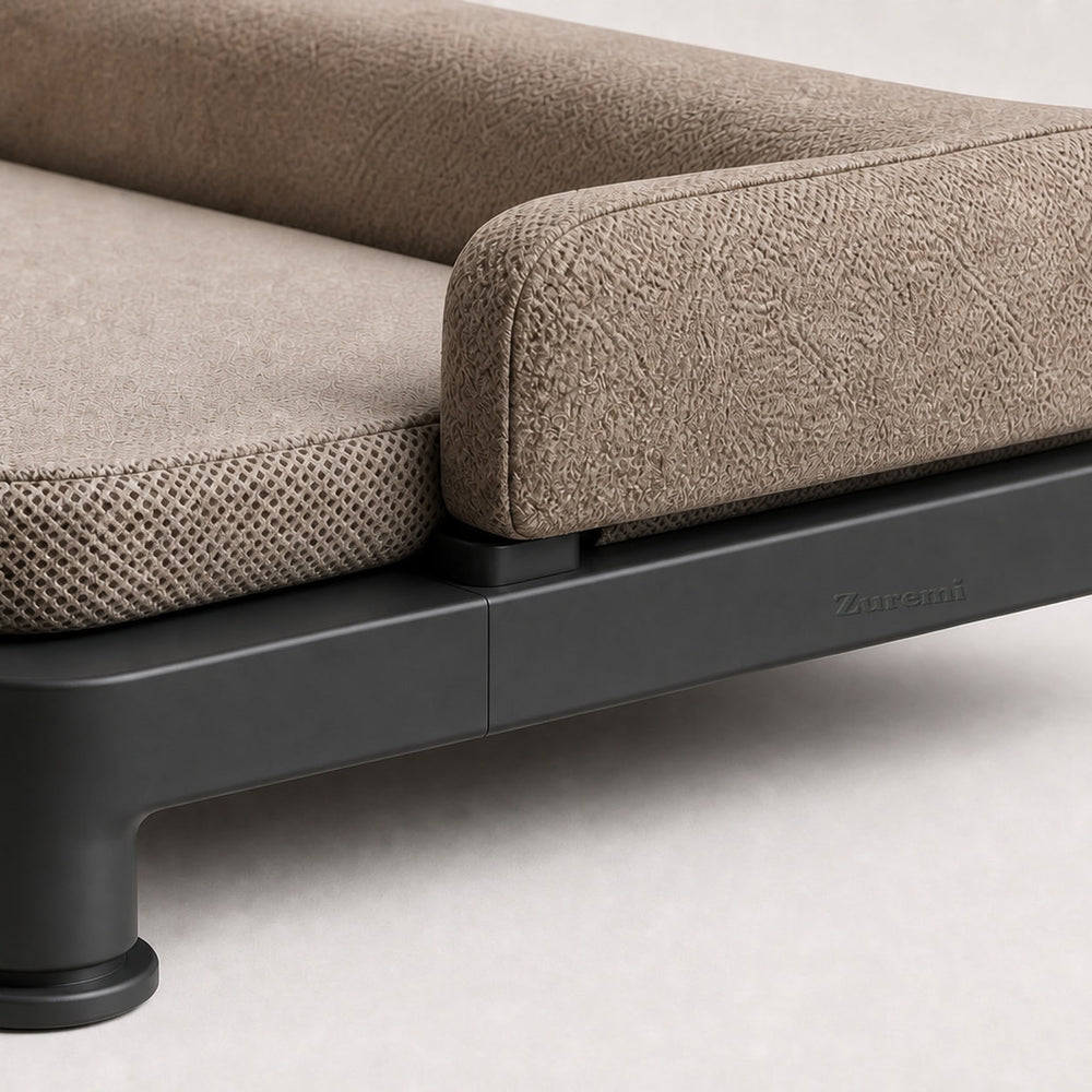 Close detail of the Zuremi Climate Rest Platform upholstery, raised graphite base and integrated wordmark